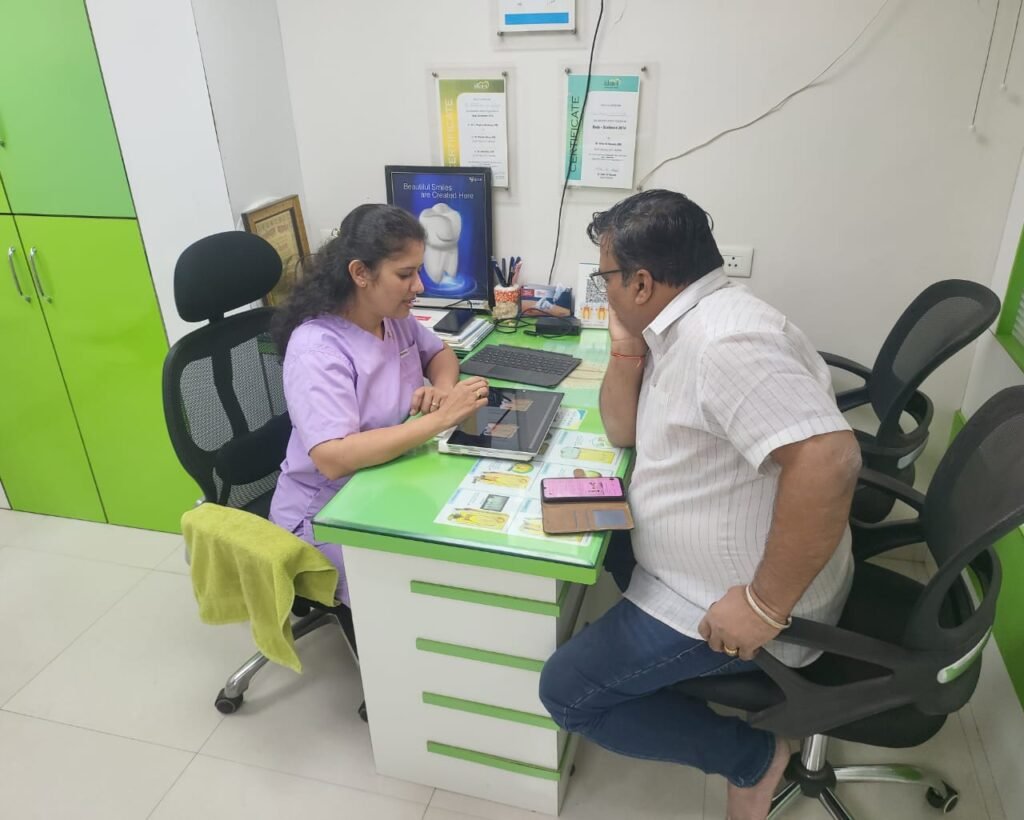 Dentist treating patient at Dr Madhuri Dental Clinic Pimpri Chinchwad